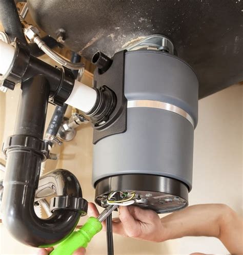 insinkerator garbage disposal leaking from bottom|How to Fix a Leaking InSinkErator Garbage Disposal